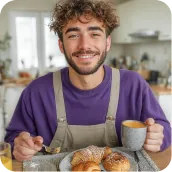 Smiling man holding a cup of coffee