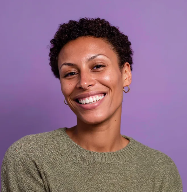 Smiling woman in a green sweater