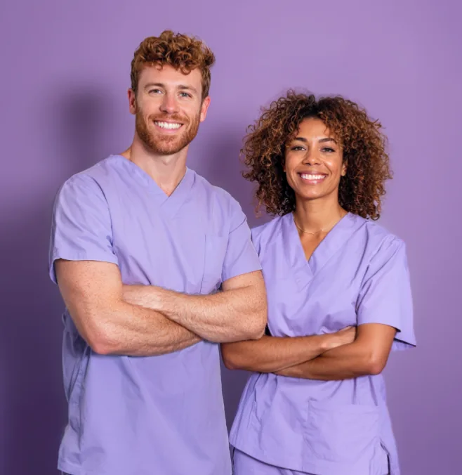 Two dentists with arms crossed