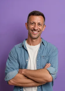 Smiling man in a denim shirt