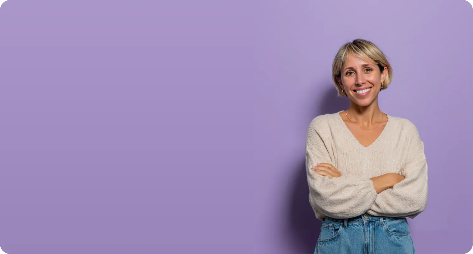 Sophie Moore smiling with crossed arms